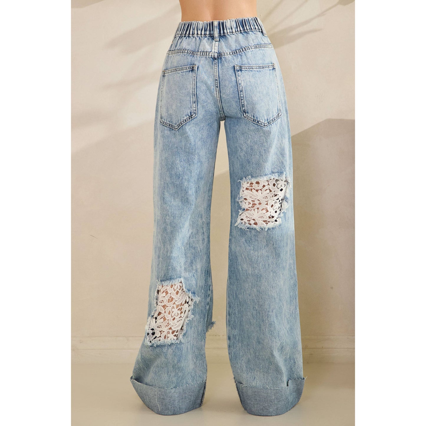 WASHED DISTRESSED LACE INSERT DENIM JEANS
